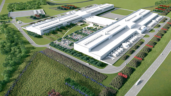 Aerial view of Sauer Group's state-of-the-art industrial complex with extensive parking and green sp.